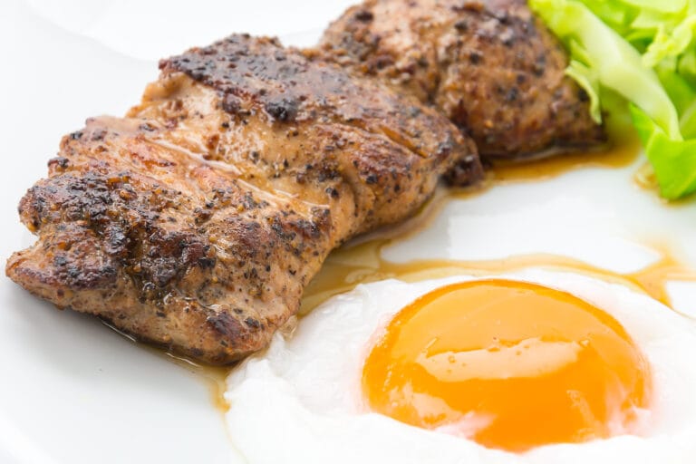 Juicy Pork Steak with Sunny-Side Egg & Crisp Greens